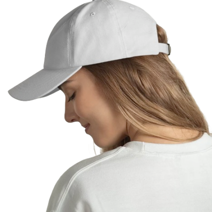 A young woman wears a blank white baseball cap while looking to the side. Custom baseball caps are available through custom custom clothing.